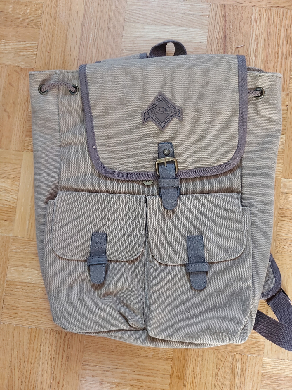 CANADA ROOTS Beaver Canoe Canvas Roll-Top Backpack with Front Pockets